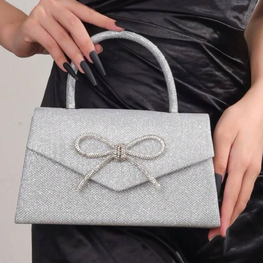 Elegant Silver Handbag with Bow Accent